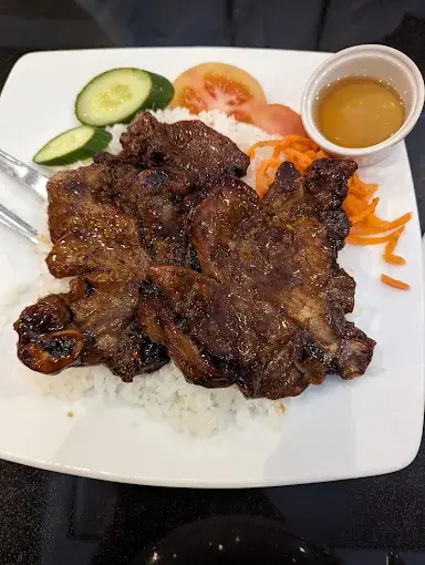 Best chicken confit on rice in Airdrie, AB